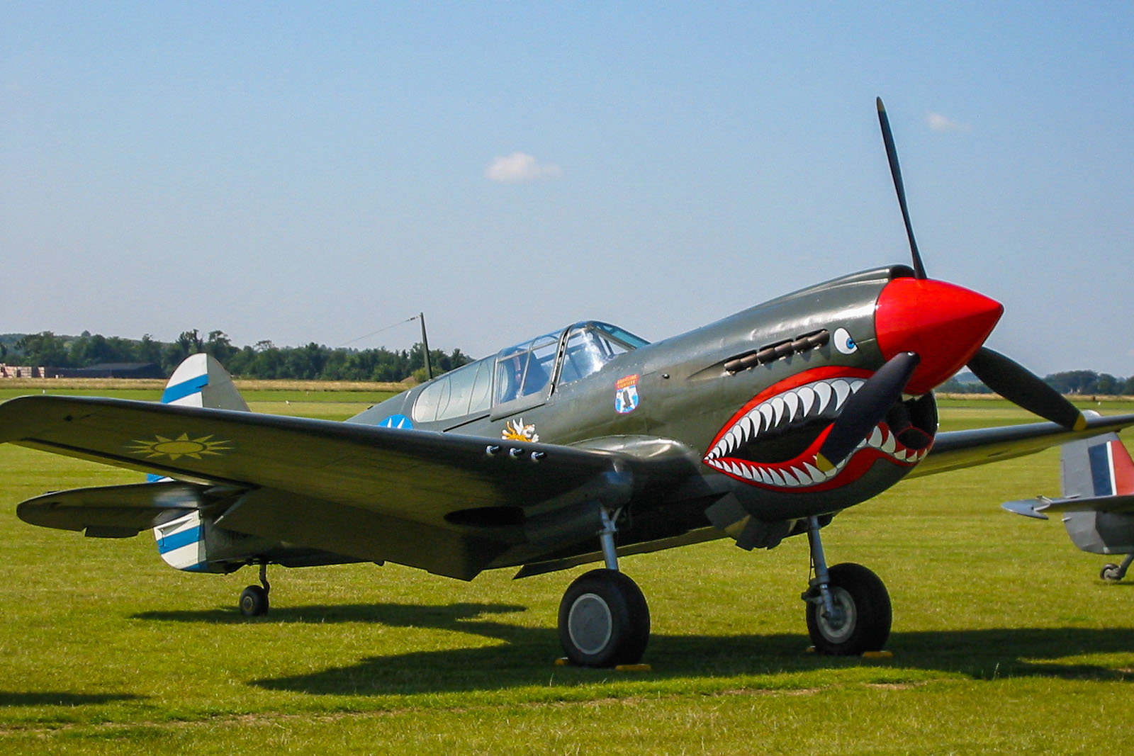 P-40 Kittyhawk with Flying Tigers Chinese markings.  Click for next photo.