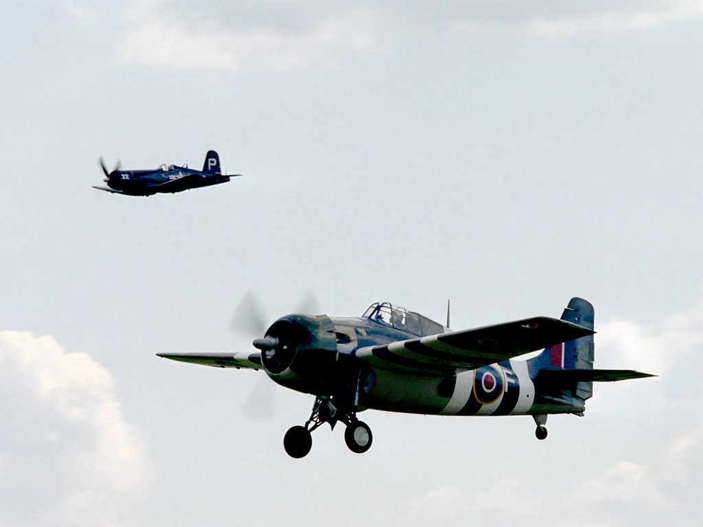 Wildcat takes off as Corsair flies past.  Click for next photo.