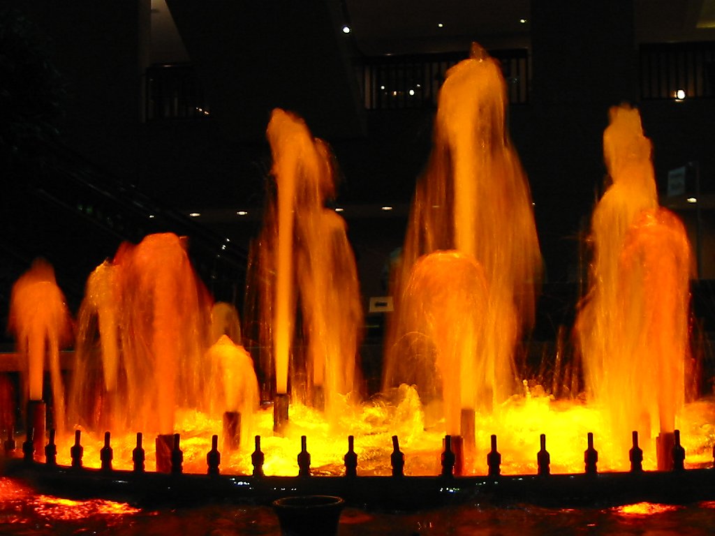 Fountain inside the lobby of the Hyatt Regency Hotel in Kansas City, 2003.  No memorial plaque marks the spot, but this is where 114 people died in a 1981 walkway collapse.  Click for next photo.