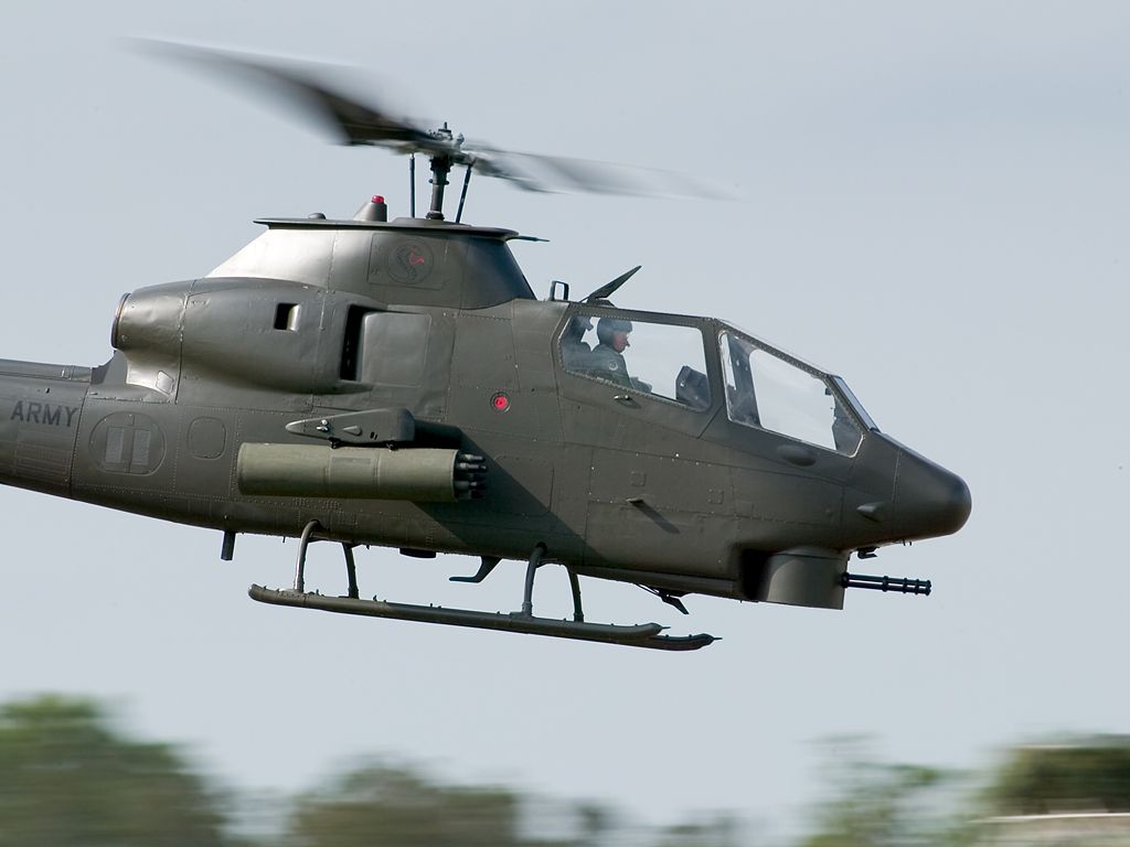A Cobra helicopter demonstrates Vietnam battle tactics.  Click for next photo.