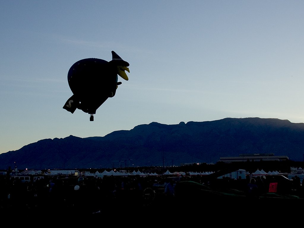 Witch balloon before dawn, Albuquerque Balloon Fiesta.  Click for next photo.