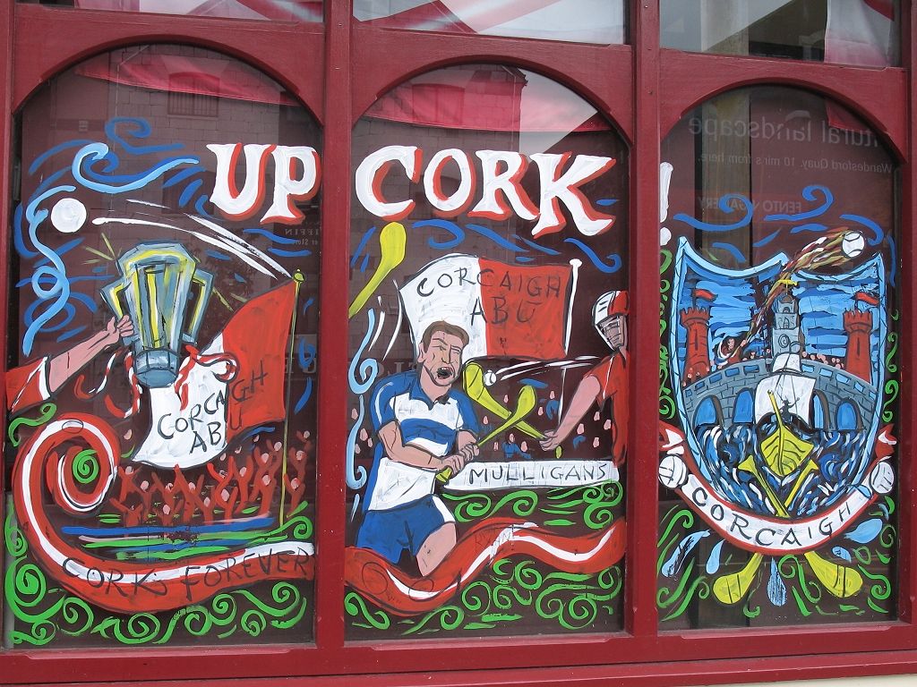 Cork pub painted its windows in support of the local hurling club playing in the All-Ireland championship that weekend, Ireland.  Click for next photo.