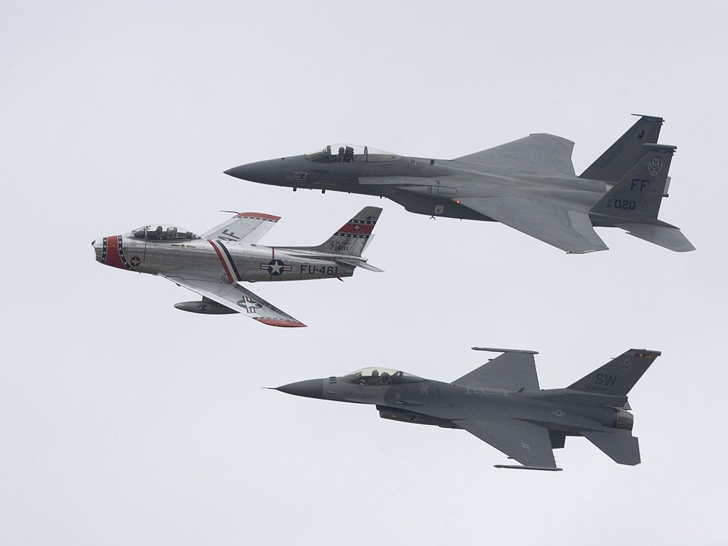 Heritage Flight, Rhode Island ANG, F-86 Sabre, F-15 Eagle, F-16 Falcon.  Click for next photo.