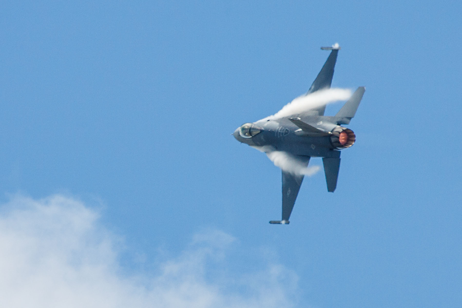 F-16 Falcon smashing moisture out of the air, TICO Warbirds Air Show, Titusville, Florida.  Click for next photo.