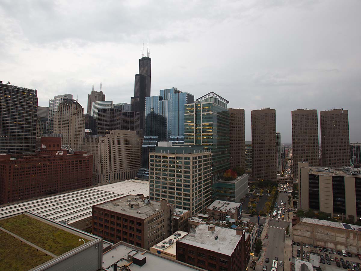 View from the Chicago apartment building I lived in 2011-2013.  This is from the rooftop looking south down Jefferson St.  The Willis Tower towers over its neighbors.  At right, the four buildings in a row are the Presidential Towers (apartments).  Photo taken October 2012.  Click for next photo.