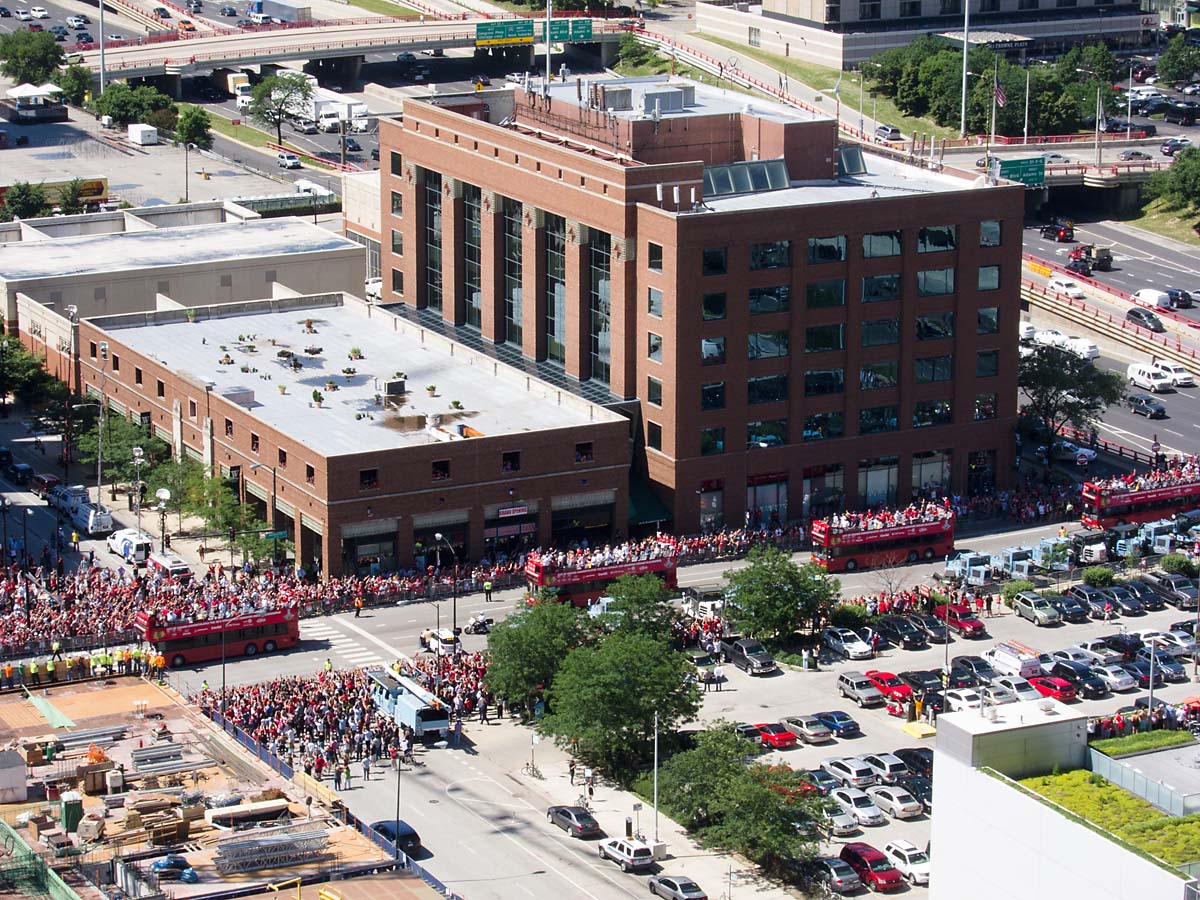 From the top of my apartment building, I took this snapshot as the Chicago Black Hawks Stanley Cup parade passed within a couple of blocks.  Click for next photo.