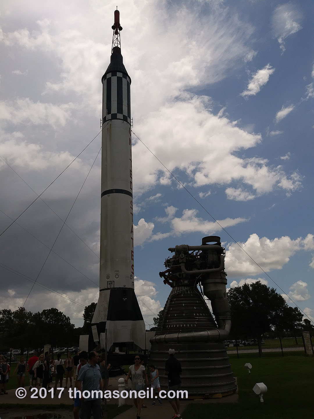 Redstone rocket used for Mercury missions next to a Saturn V engine, Johnson Space Center, Houston, 2017.  Click for next photo.