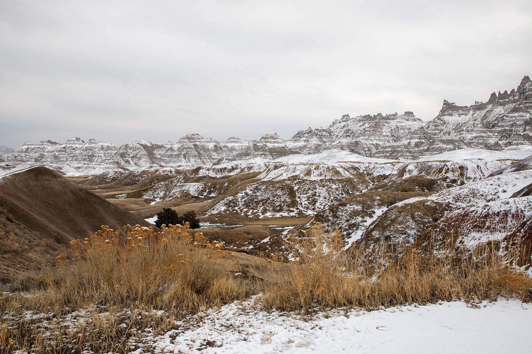 A dusting of snow on the Badlands.  Click for next photo.