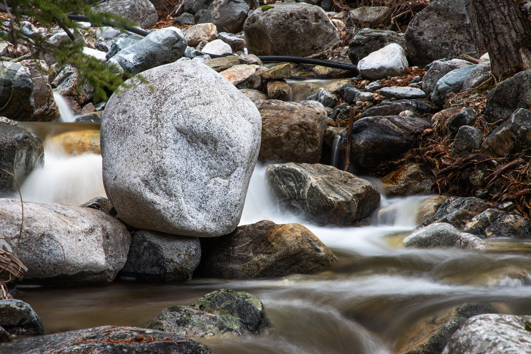 Snow Creek in the national forest,.  Polarizer filter, exposure 1.6 seconds.  Click for next photo.