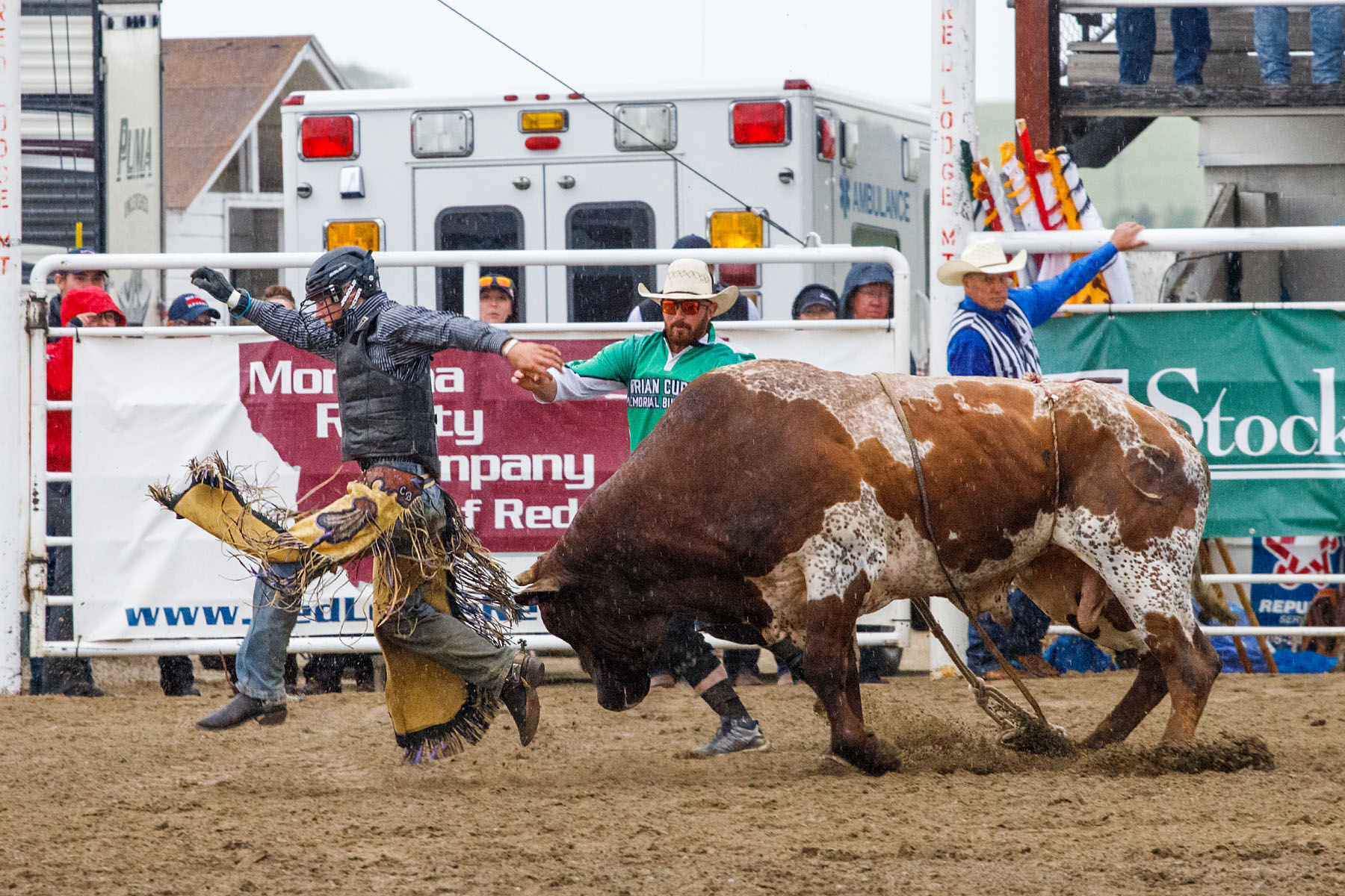 Cowboy runs for it, PRCA Xtreme Bulls, Red Lodge, MT.  Click for next photo.