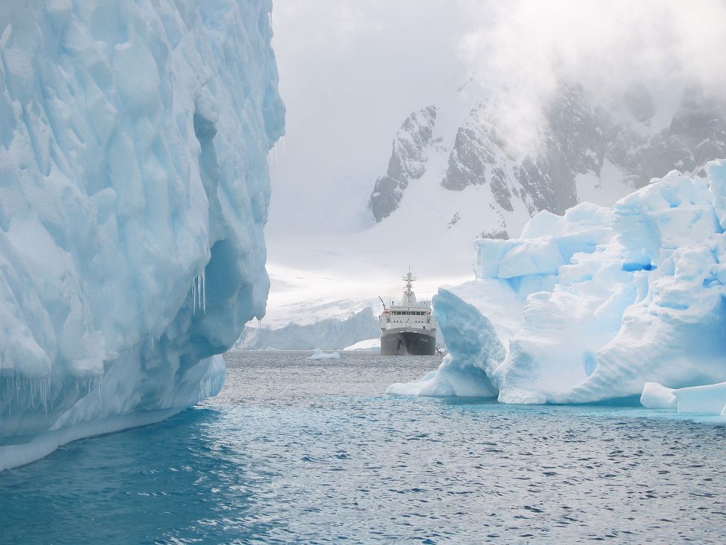 Cruising among the icebergs in a Zodiac.  Click for next photo.