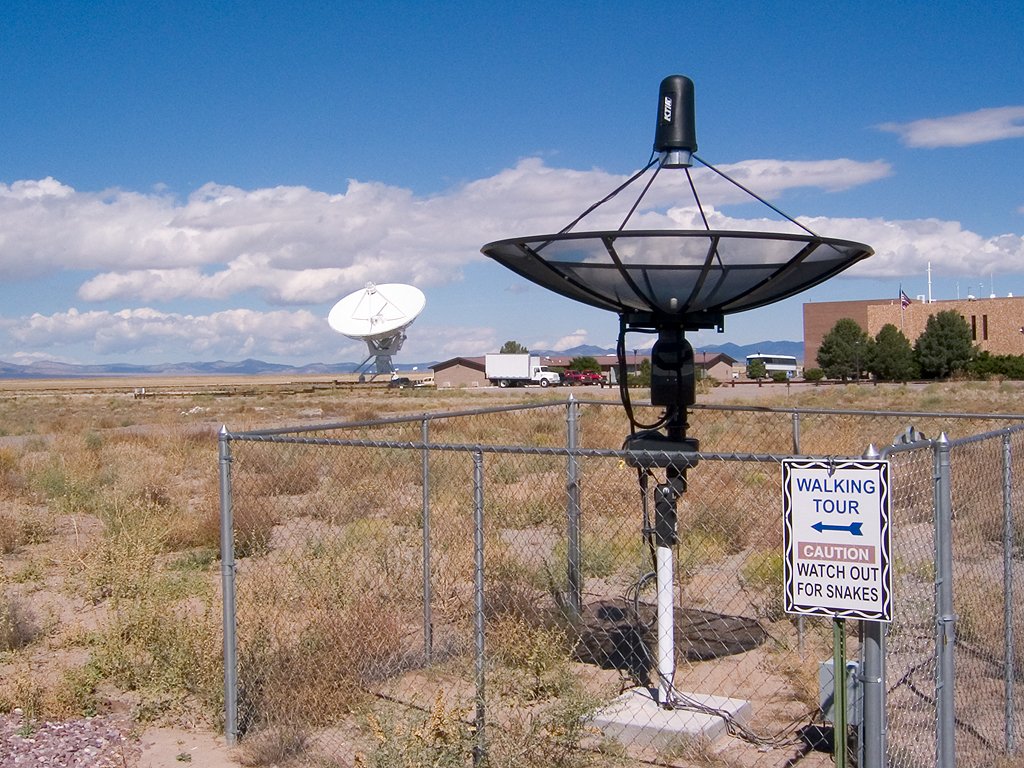 This small dish is used for a visitor center demonstration, National Radio Astronomy Observatory near Socorro, New Mexico, 2004.  Note the sign.  Click for next photo.