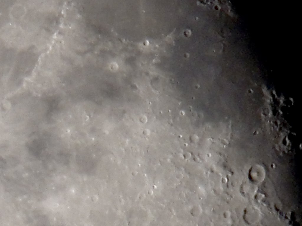 Digiscoping the waning Moon, Canon G6 and Televue 85.  Detail of previous image, showing the 100 km crater Theophilus (with the obvious center peak) lower right and part of the Montes Apenninus mountains upper left.  Click for next photo.
