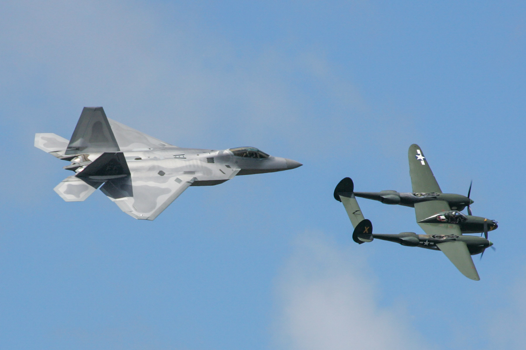 Heritage flight, F-22 and P-38, Sioux Falls Air Show.  Click for next photo.