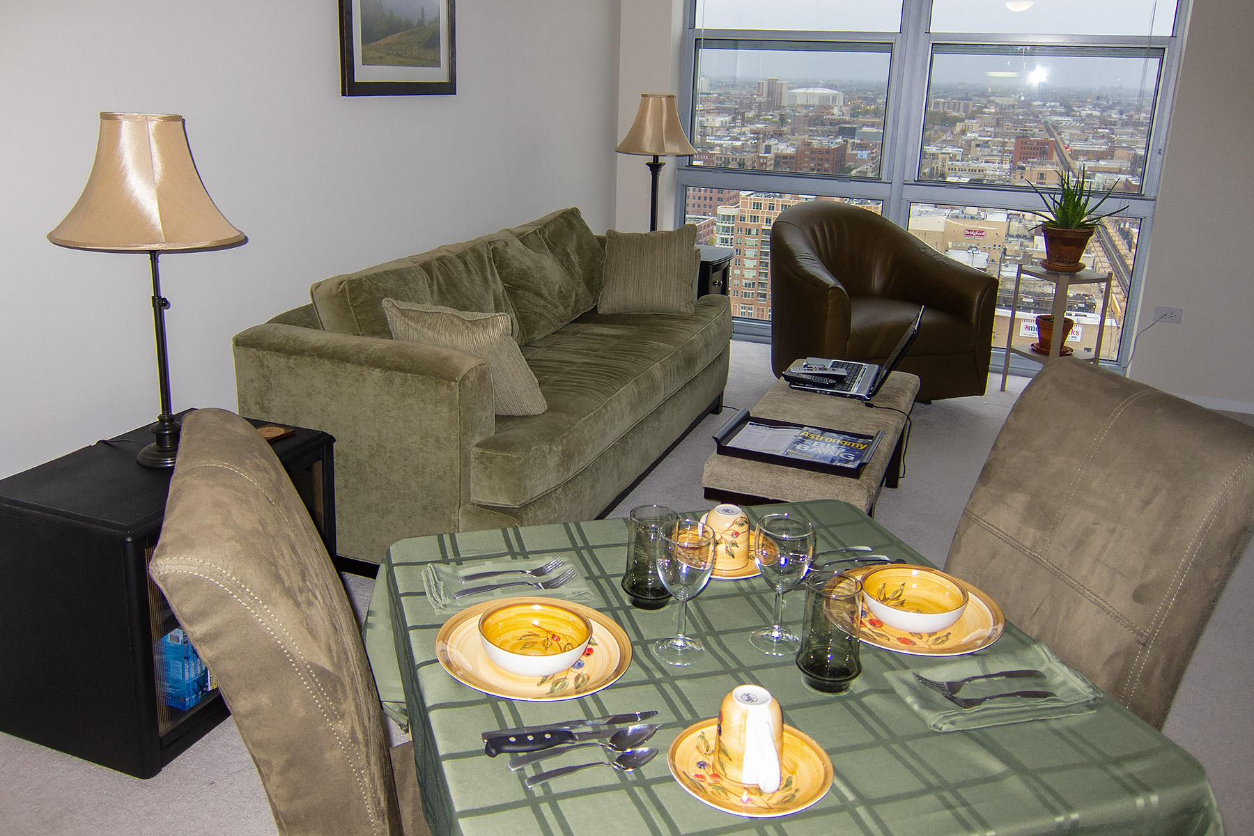 I took this snapshot of my 27th-floor Chicago apartment shorting after moving in.  The apartment faced west, away from downtown, so very few landmarks were visible except the United Center (Bulls, Black Hawks), the white building in the middle left window.  Click for next photo.