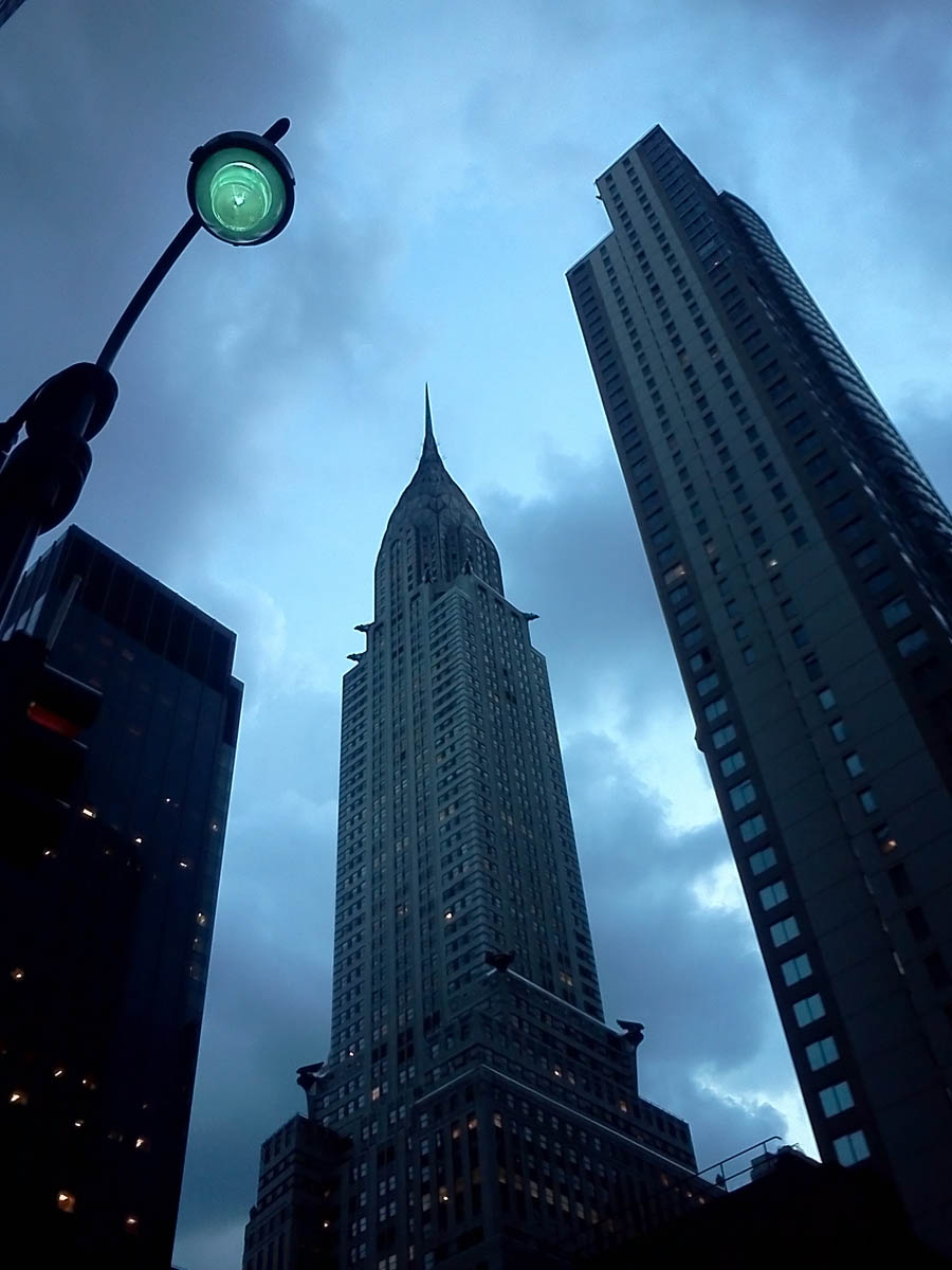 Chrysler Building at dusk, May 2012.  Maybe the only camera phone photo I’ve posted on my site, but (for me) it captures a mood.  And the street light hanging over the scene sort of brought to mind a Martian walker from "War of the Worlds."  Click for next photo.