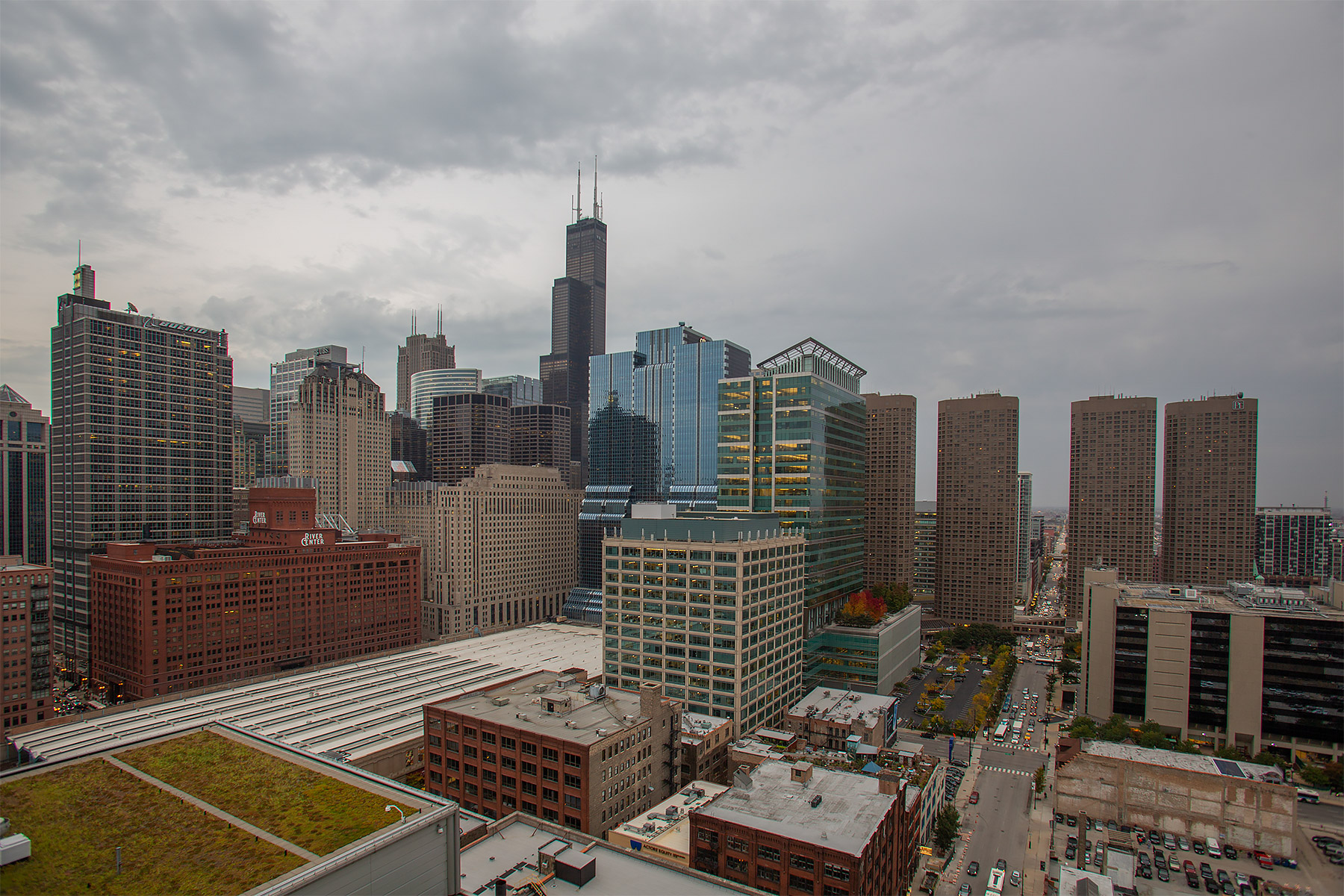 View from the Chicago apartment building I lived in 2011-2013.  This is from the rooftop looking south down Jefferson St.  The Willis Tower towers over its neighbors.  At right, the four buildings in a row are the Presidential Towers (apartments).  This is the first image posted from the Canon 5D Mark III camera.  Click for next photo.