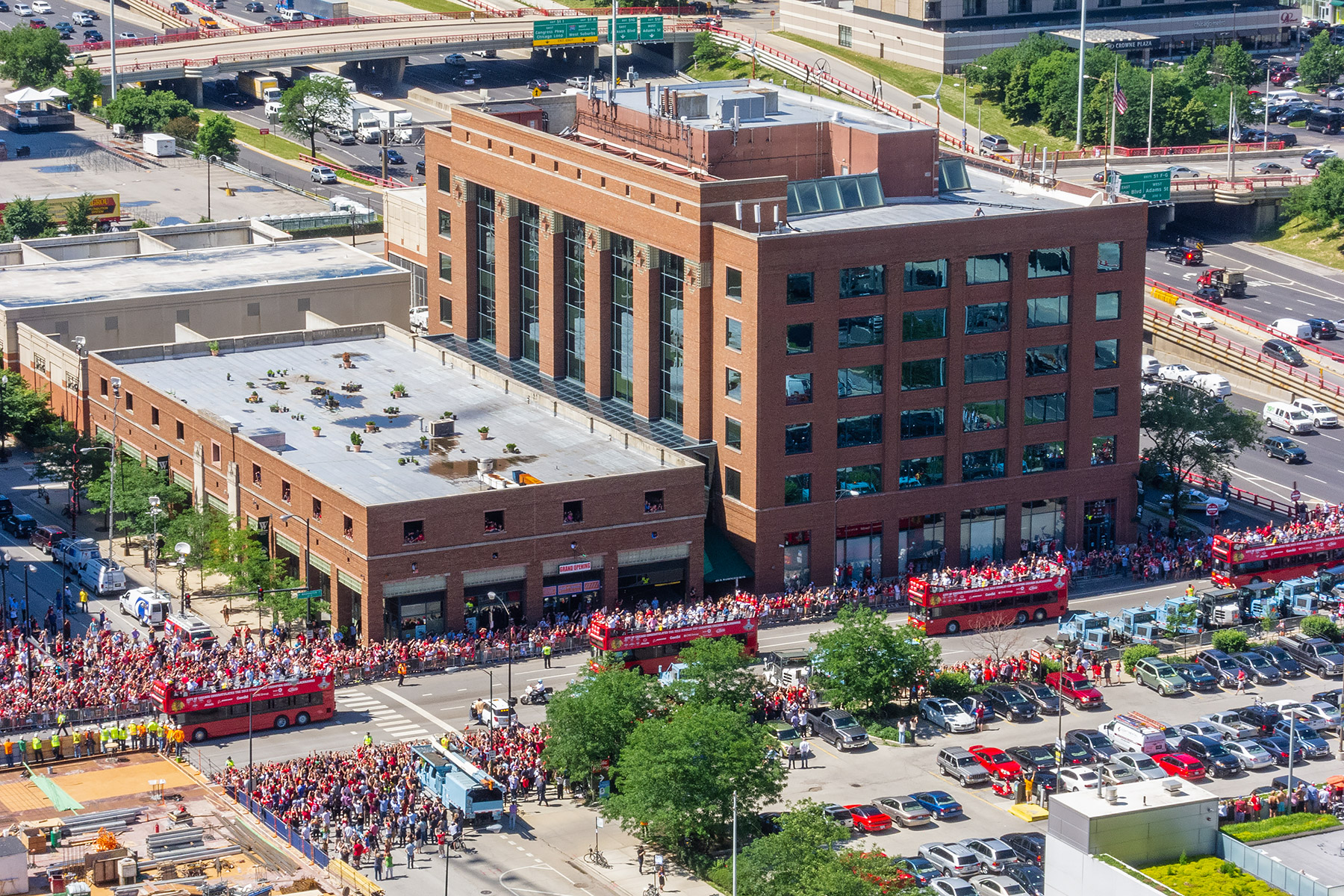 From the top of my apartment building, I took this snapshot as the Chicago Black Hawks Stanley Cup parade passed within a couple of blocks.  Click for next photo.
