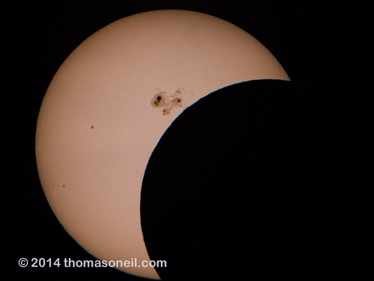 Partial solar eclipse, October 23, 2014.  Last good shot I got before the clouds got in the way.  Click for next photo.