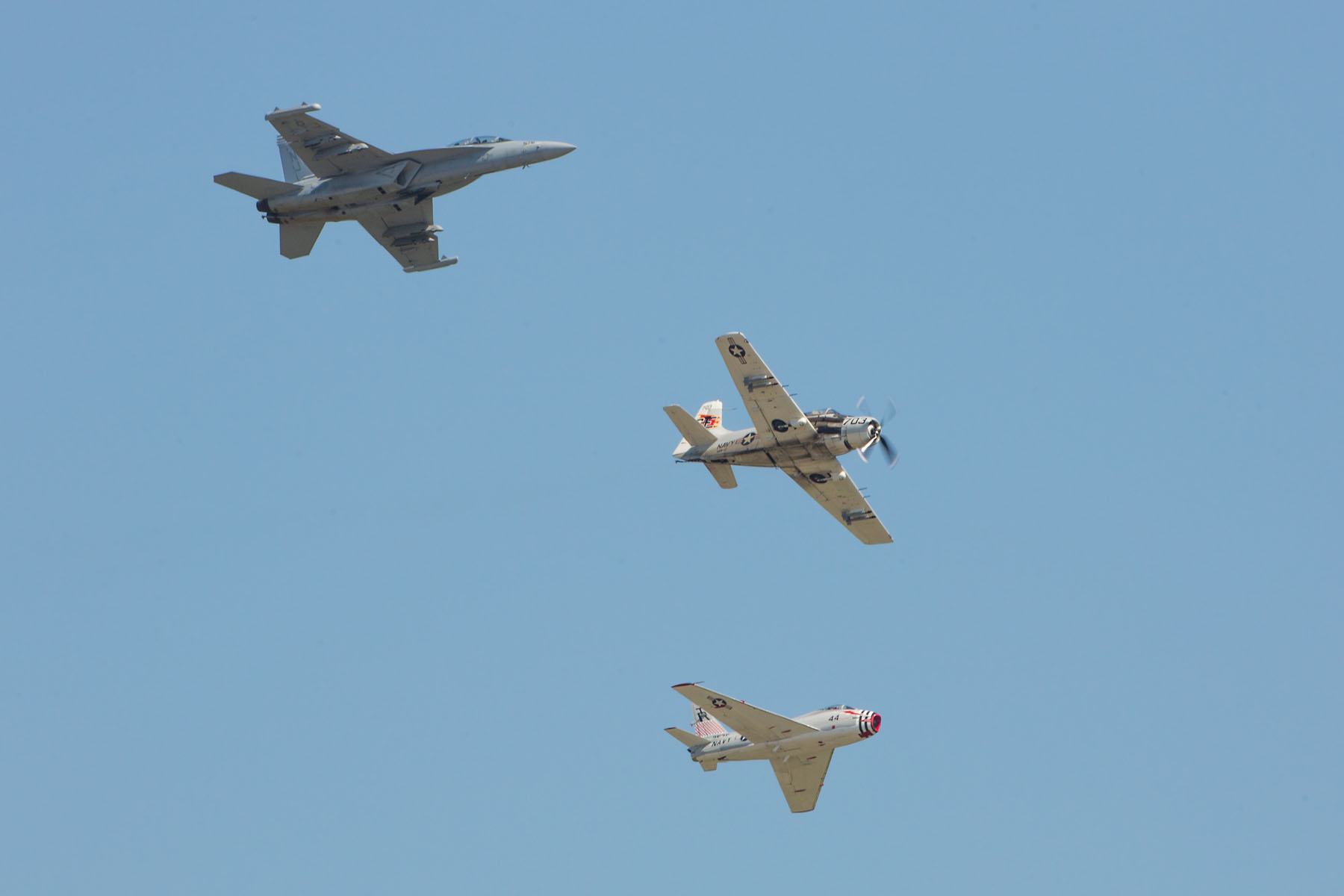 Heritage flight, Sioux Falls Air Show.  The flight featured Navy planes (from top) F/A-18 Hornet, AD-4 Skyraider, and FJ-4B Fury.  Click for next photo.