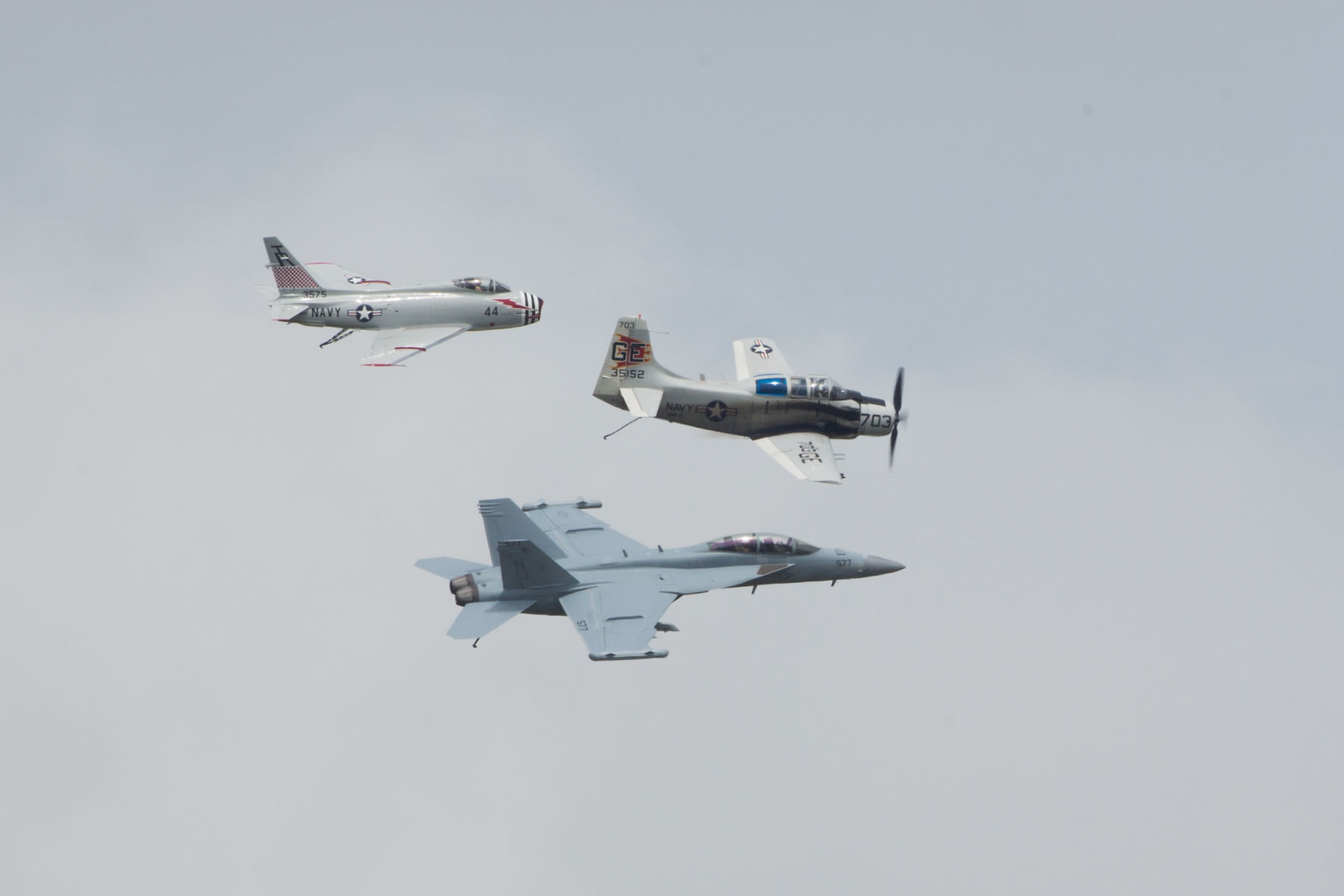 Heritage flight, Sioux Falls Air Show.  The flight featured Navy planes (from top) FJ-4B Fury, AD-4 Skyraider, and F/A-18 Hornet.  Click for next photo.