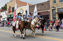 Home of Champions Rodeo Parade.  These riders represent the three ranches which are primary sponsors.
