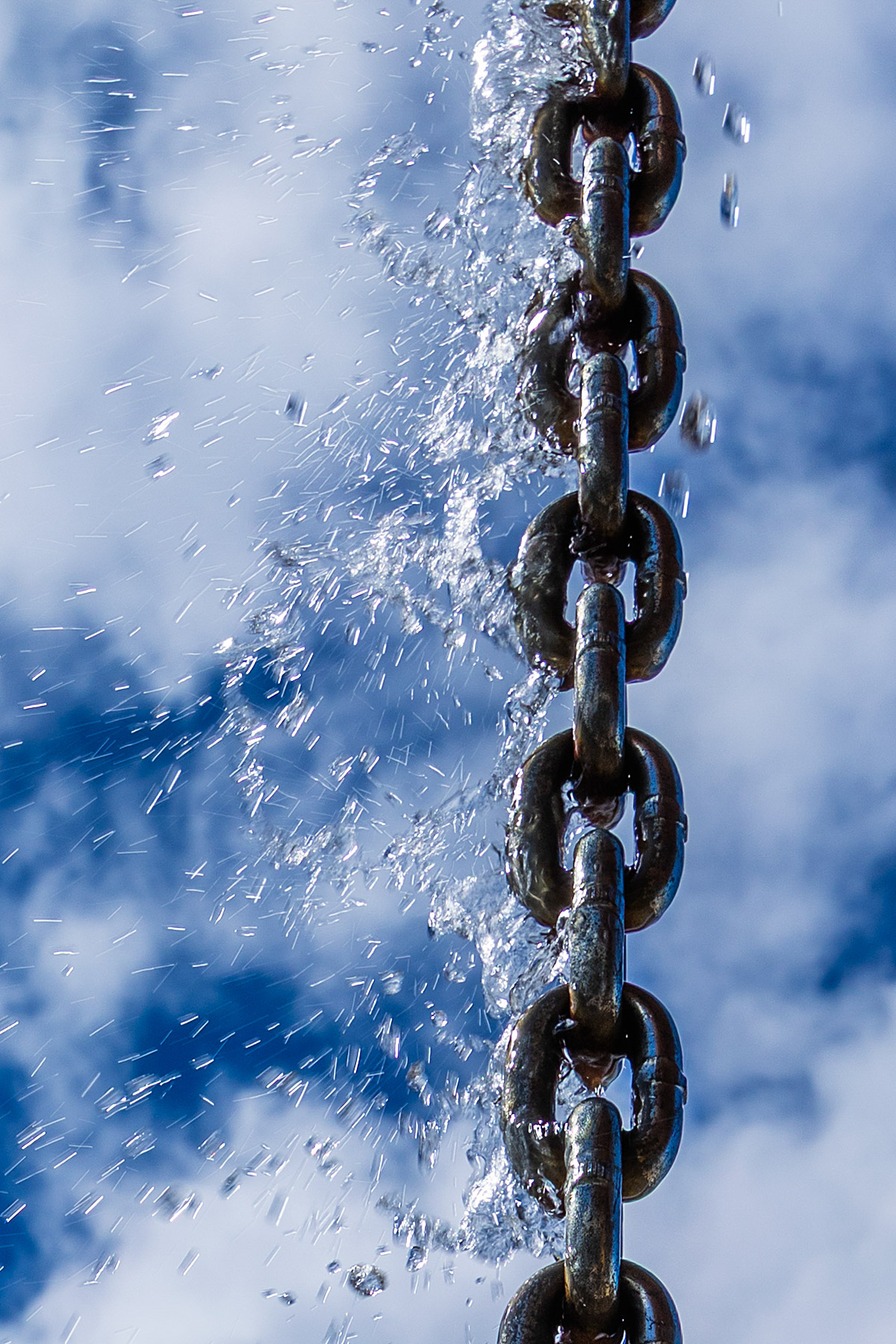 Snow melt in a deluge from the roof.  Click for next photo.