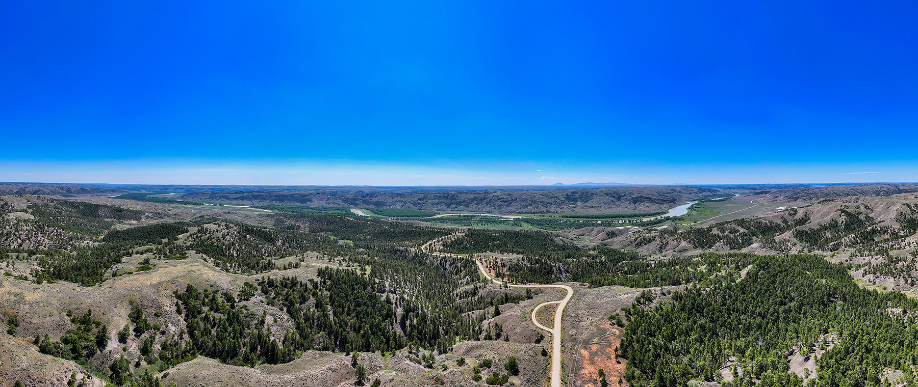 Drone panorama, Missouri River, Montana.  This is a downsized image for the web, but there are 87.5 million pixels in the original and you can see individual trees on the far shoreline.  Click for next photo.